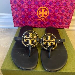 Tory Burch leather navy sandals.